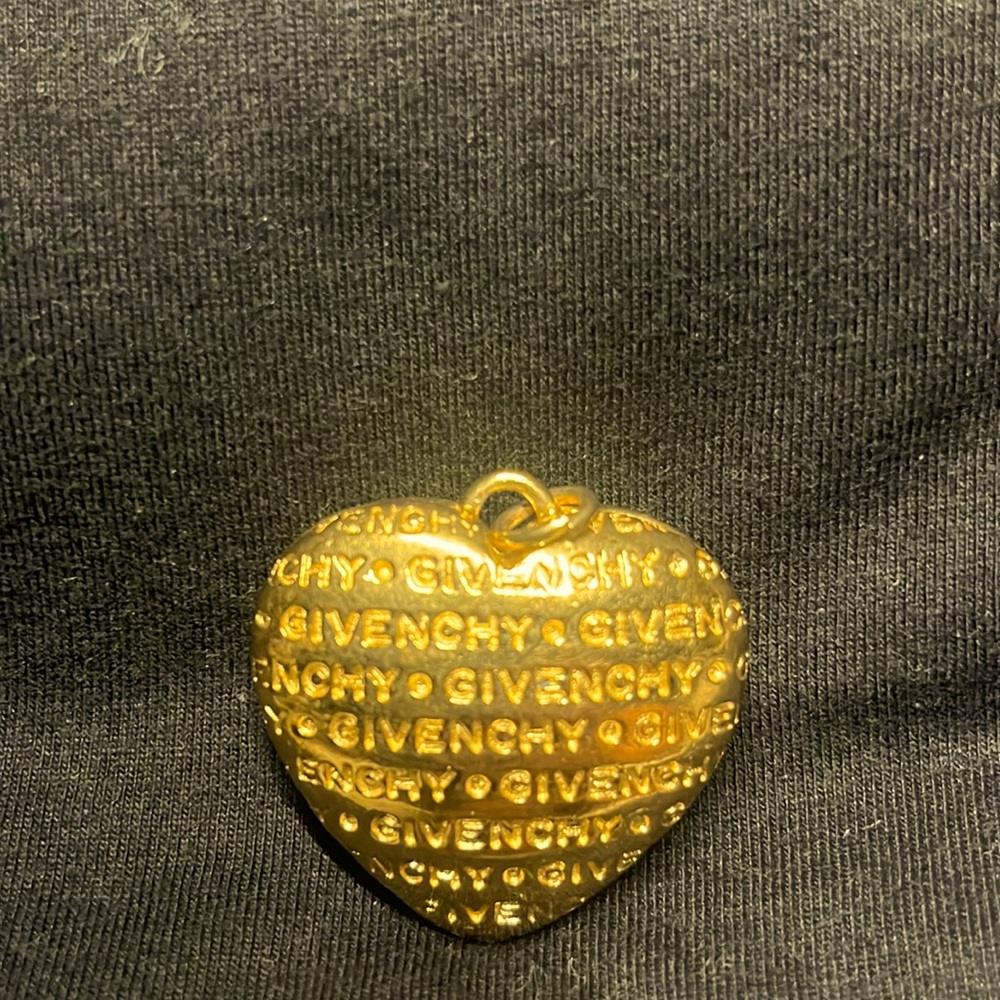 I have a beautiful necklace charm GIVENCHY GOLD CHARM VERY NICE